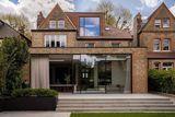 A renovated victorian property with neutral tones & harmonious materials decoration in london