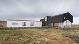 A Mannal House featuring a gable-shaped glass wall has been completed on Tiree