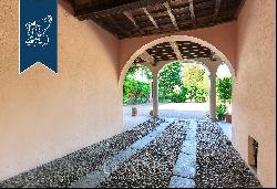 Ancient prestigious estate with a garden, pool and water spring for sale on the outskirts 