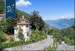 Villa with panoramic turret for sale by Lake Como