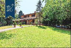 Elegant estate for sale with vast agricultural grounds in Lombardy