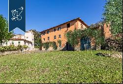 Luxury villa with small castle and olive grove for sale near Florence