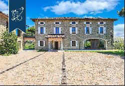 Estate of great charm with a cellar producing the finest wines of the area
