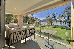 Muzzano: modern apartment pied dans l'eau on Lake Lugano for sale