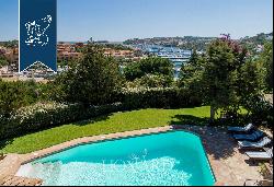 Luxury villa surrounded by a wonderful leafy garden in Porto Cervo's marina.