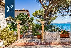 Sea-facing villa surrounded by 5,000-sqm of Mediterranean scrub by Monte Argentario's sea