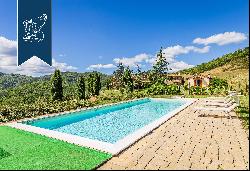 Luxury farmhouses converted into an accommodation facility in a stunning panoramic positio