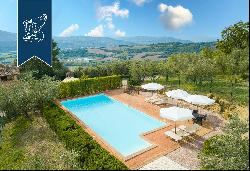 Enchanting agritourism resort in a panoramic position on Umbria's hills for sale