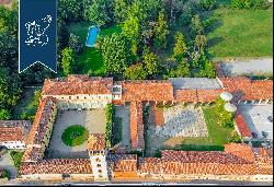 Charming period estate with a panoramic tower for sale a few kilometres from Milan