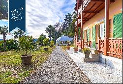 Charming period villa for sale by Lake Maggiore, with a private beach and two boat spaces