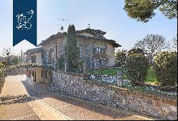 Elegant estate in a rustic style for sale close to lakes Iseo and Garda