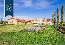Wonderful estate consisting of 10 buildings with a lake, a tennis court, a swimming pool a