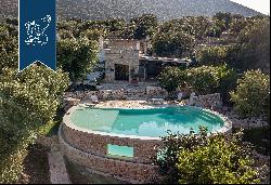 Elegant villa with a pool and trulli for sale in a panoramic position in Monopoli