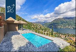 Villa with a park, pool and panoramic terraces for sale on a hill above Cernobbio