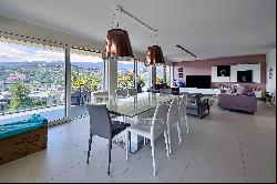 Lugano-Pregassona: spacious penthouse apartment for sale with magnificent view of the cit