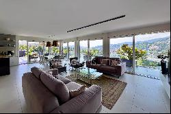 Lugano-Pregassona: spacious penthouse apartment for sale with magnificent view of the cit