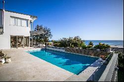 LUXURIOUS COASTAL LIVING WITH THIS EXTRAORDINARY 5-BEDROOM HOME LOCATED IN PRESTIGIOUS CA