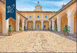 Historical villa with a pool and Italian-style garden in an exclusive position in Pavia