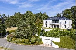 A Jewel of Elegance and Exclusivity Adjacent to the Lausanne Golf Course.