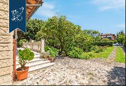 Historical villa with a sea-facing turret for sale one step from Forte dei Marmi