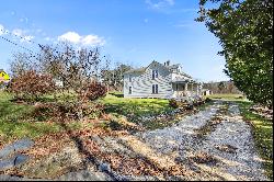 New England Farmhouse Set on 9+ Country Acres with Views & Possibilities