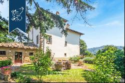 Exclusive panoramic relais with a big park and a vineyard for sale near Arezzo