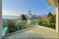 Lugano-Origlio: elegant duplex penthouse apartment with roof terrace & open view of natur