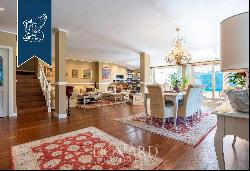 Luxurious villa for sale in Casal Palocco, an exclusive neighbourhood of Rome, offering a 