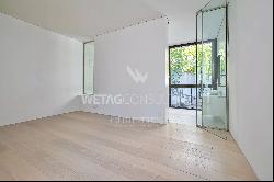 Modern apartment in Lugano with private garden for sale