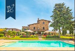 Ancient, finely renovated and enchanting Tuscan farmhouse for sale between Florence and Pr