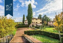 Luxurious apartment with a pool for sale among Tuscany's charming hills
