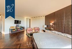 Luxurious, recently-renovated penthouse for sale on the top two floors of an elegant build