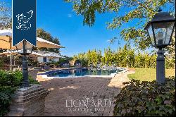 Stunning property with a gym and a private park surrounded by the leafy Agro Romano area f