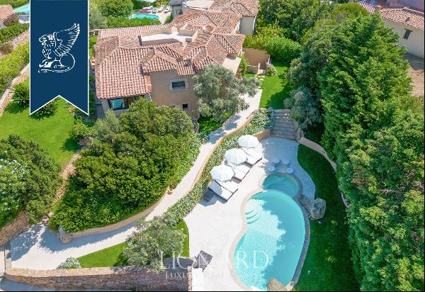 Typical stone villa with a stunning pool for sale in Porto Cervo, surrounded by nature amo
