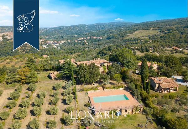 Charming agritourism resort with panoramic terraces and private park for sale between Orci
