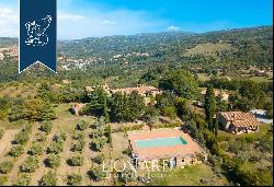 Charming agritourism resort with panoramic terraces and private park for sale between Orci