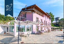 Relais surrounded by forests and vineyards for sale between the Langhe and Monferrato