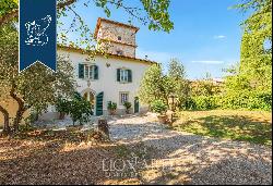 Charming 16th-century estate with a stone tower for sale in the heart of Florence
