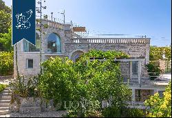 Luxury estate lying on a terraced hills with a view of the sea for sale in Puglia