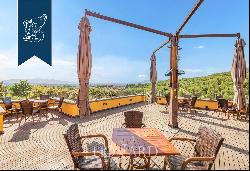 Luxurious relais with a panoramic terrace for sale in the countryside of the province of P