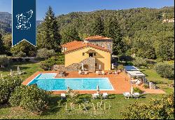 Luxury resort with pool and golf court for sale in Tuscany's Lunigiana area
