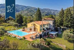 Luxury resort with pool and golf court for sale in Tuscany's Lunigiana area