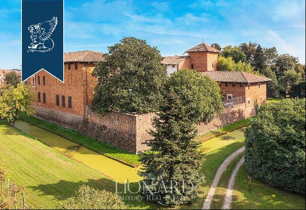 Ancient castle surrounded by a 1.4-hectare park for sale in a small historical hamlet loca
