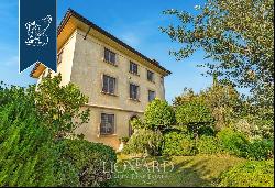 Stunning luxury villa with a pool and private park for sale in the province of Lucca