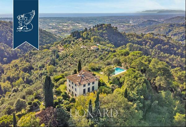 Stunning luxury villa with a pool and private park for sale in the province of Lucca