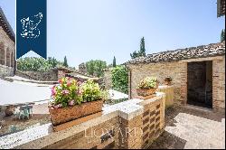 Agritourism resort with a pool for sale in the countryside between Arezzo and Montepulcian
