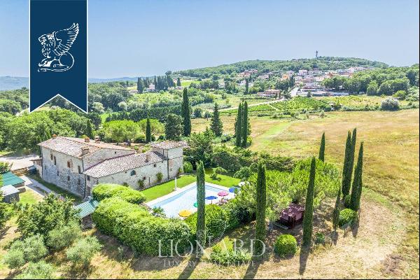Agritourism resort with a pool for sale in the countryside between Arezzo and Montepulcian