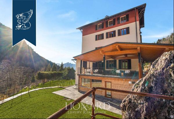 Exclusive panoramic hotel with big park and exclusive view of the Orobian Alps for sale a 
