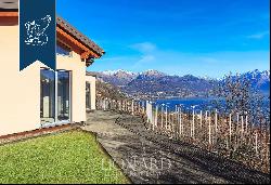 Wonderful recently built estate with big panoramic windows for sale in Pianello del Lario