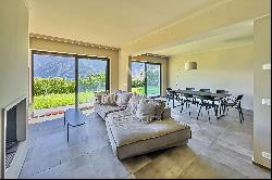 Lugano: completely renovated apartment with private garden & view of Lake Lugano for sale